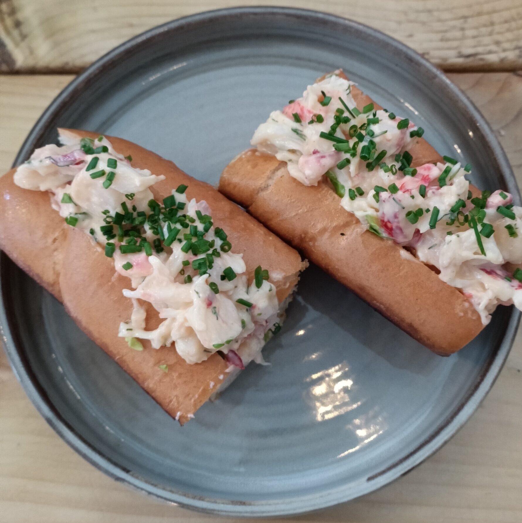 photo of a plate with prawn rolls