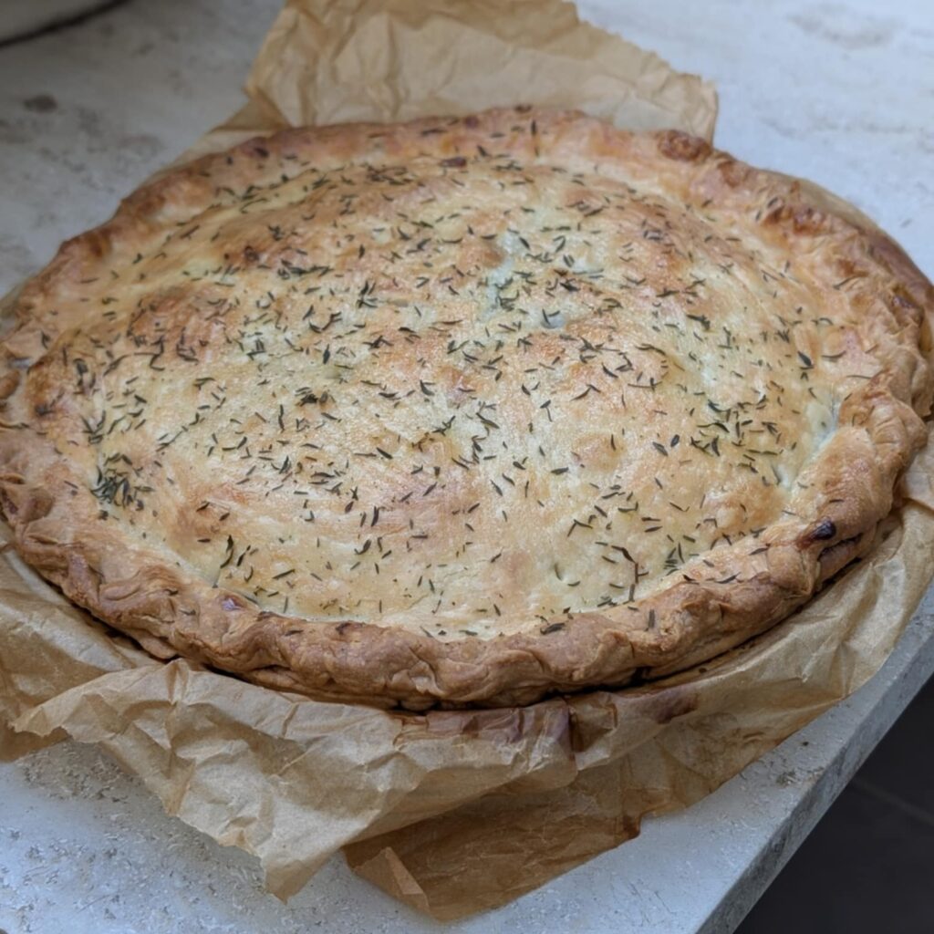 photo of a large meat pie