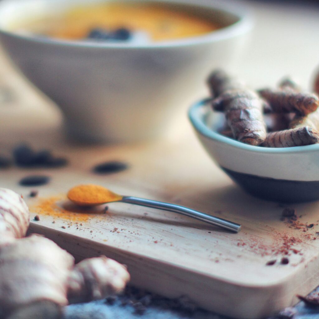 blurry photo of turmeric and ginger roots