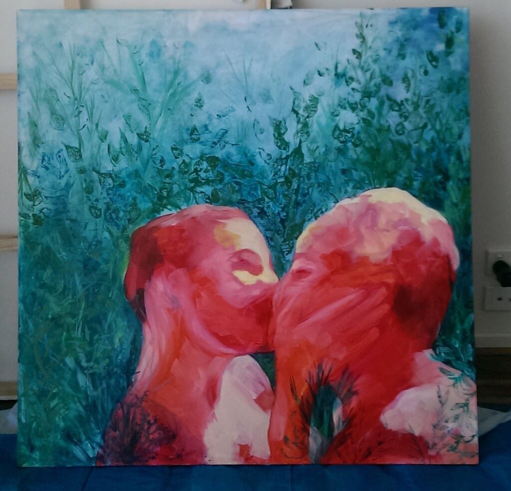 photo of a painting of two red figures kissing on a blue green background
