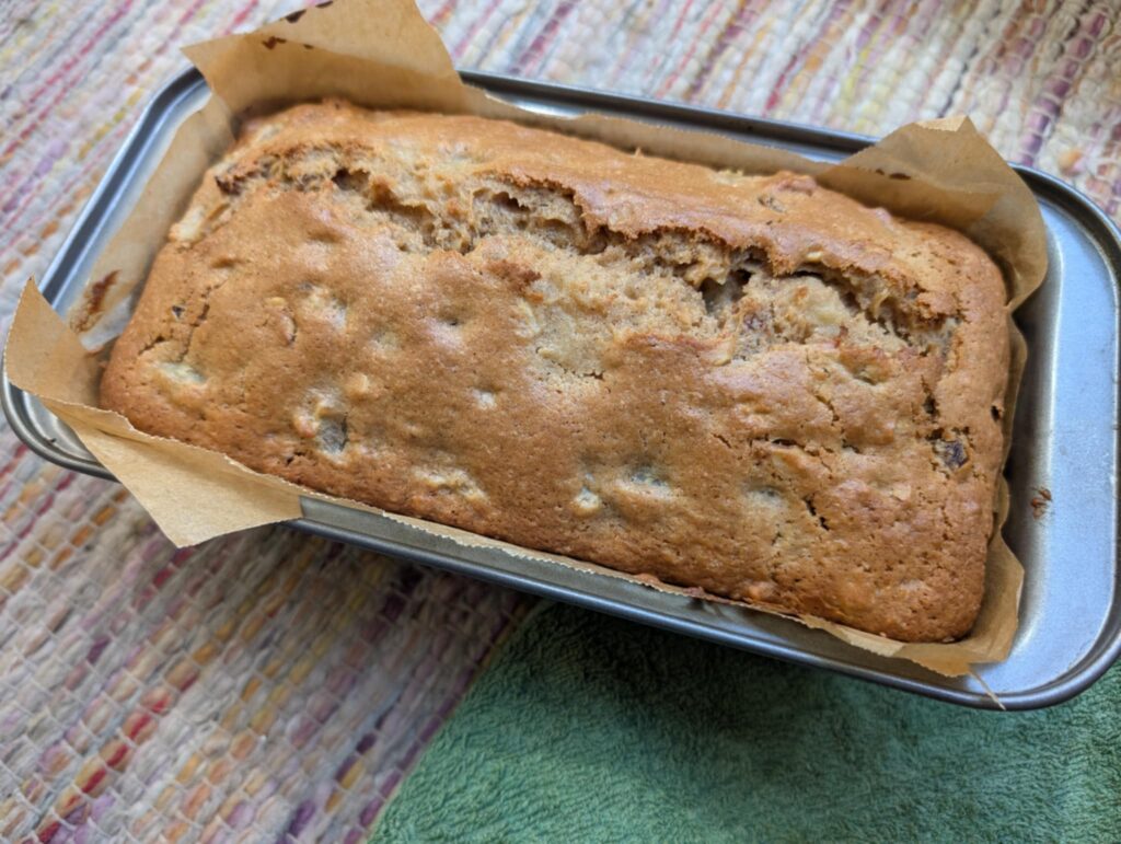 photo of nut brown cake in a loaf tin