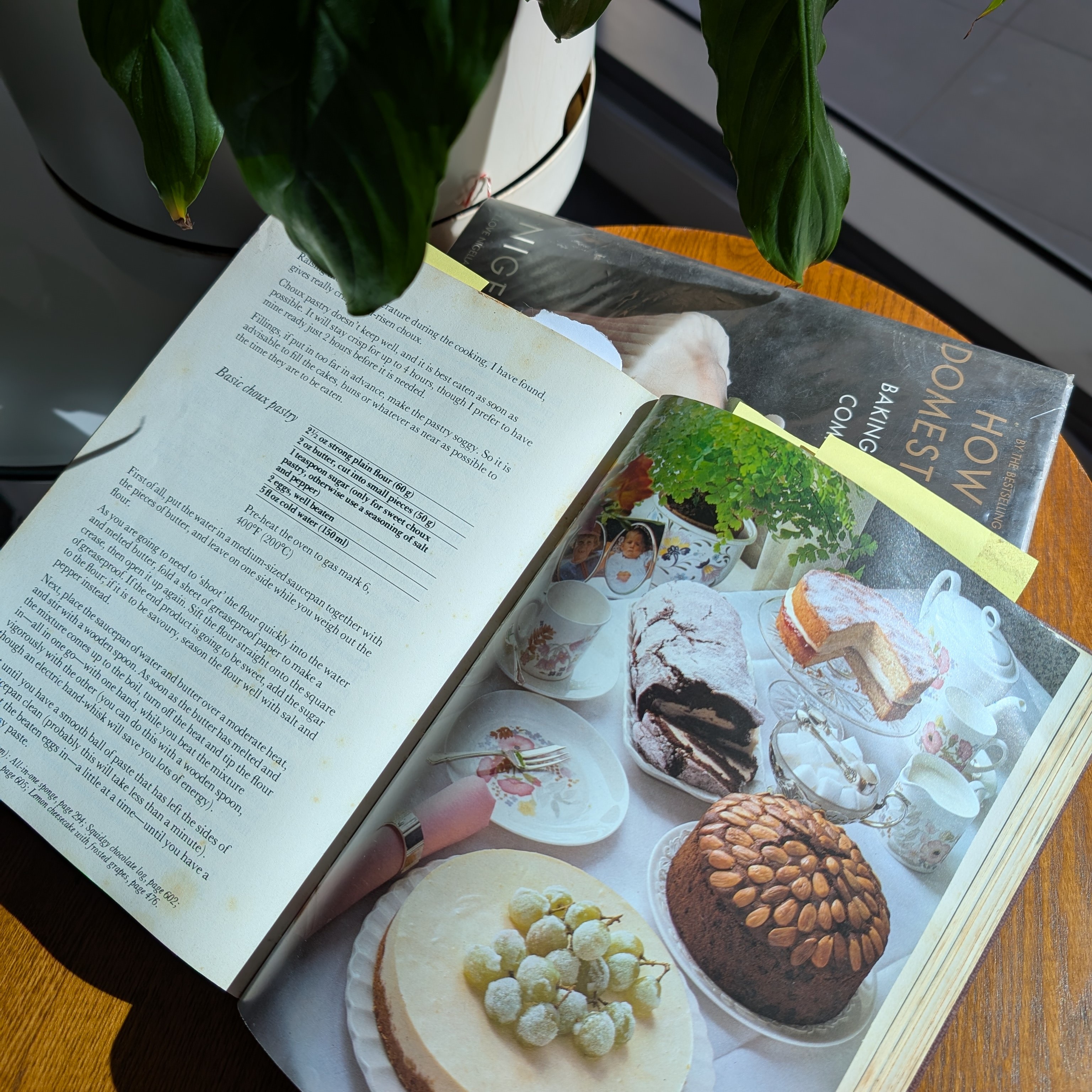 photo of recipe books piled on a wooden table