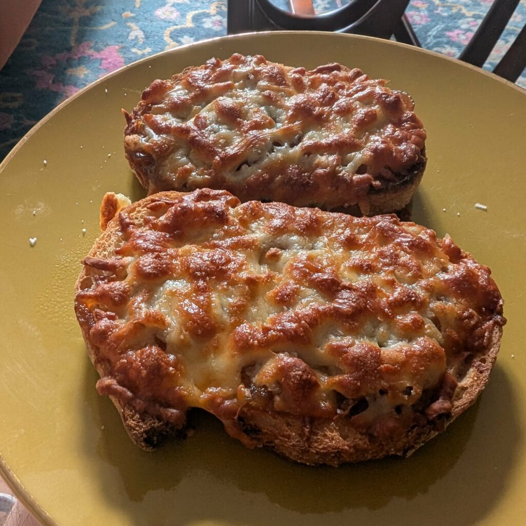 photo of grilled cheese on toast on a yellow plate