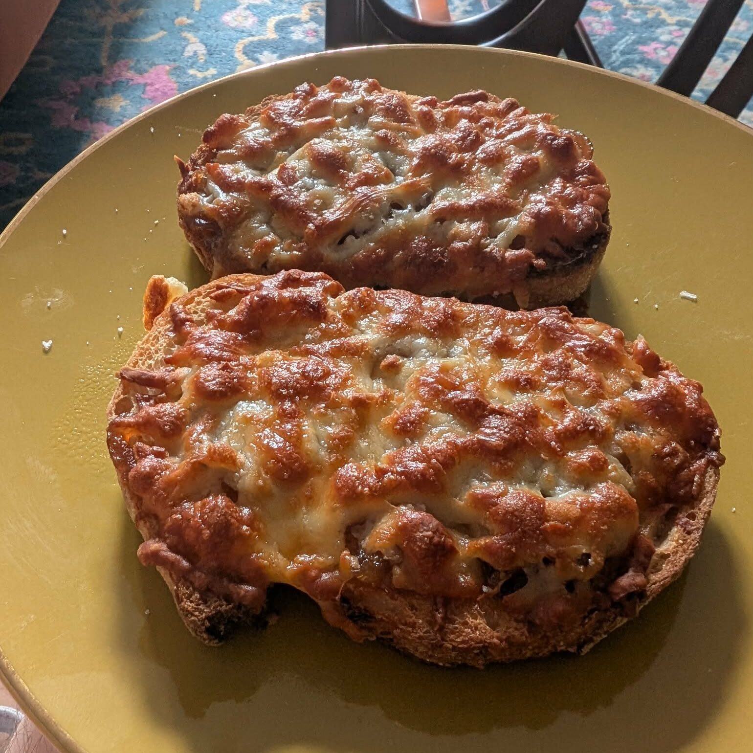 photo of grilled cheese on toast on a yellow plate